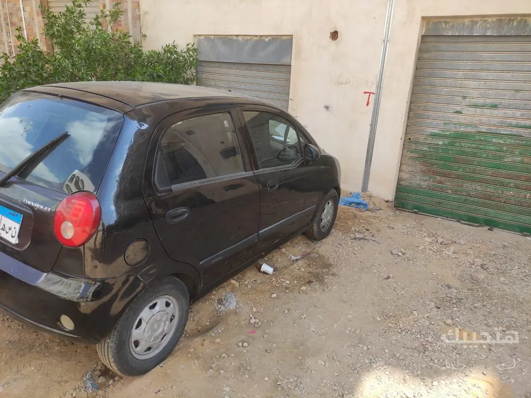 side and rear view of 2010 Chevrolet Spark