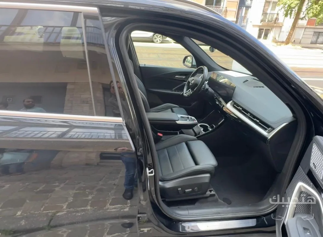 Interior and side view of 2023 BMW X1