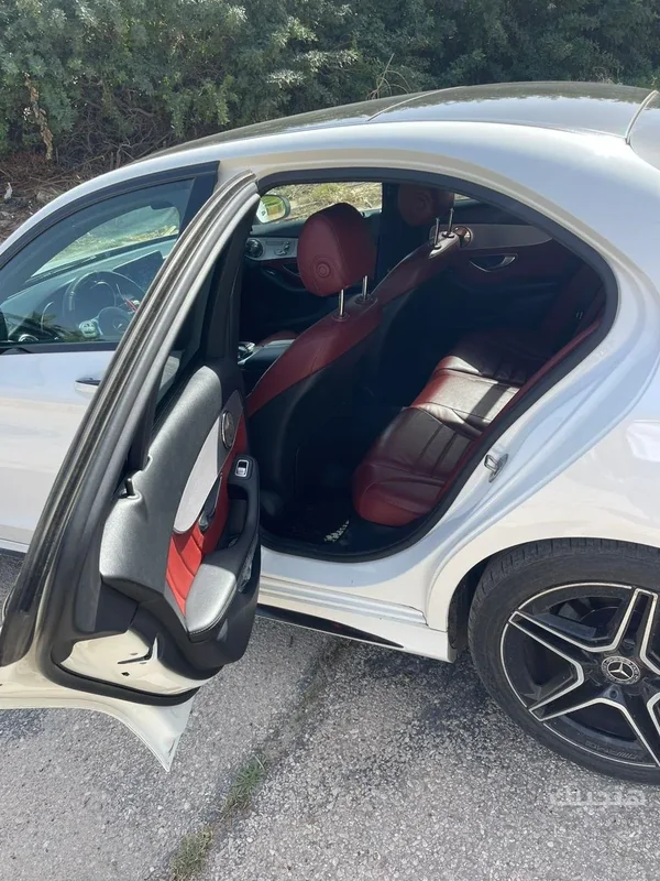Interior and side view of 2019 Mercedes-Benz C180