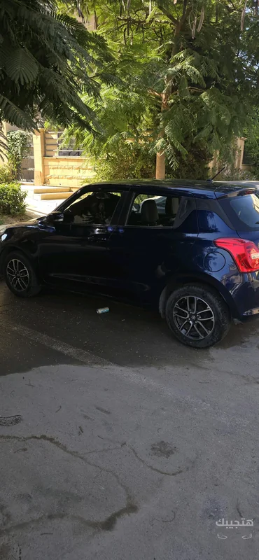 side, Interior and rear view of 2022 Suzuki Swift