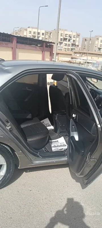 Interior and side view of 2010 Kia Cerato
