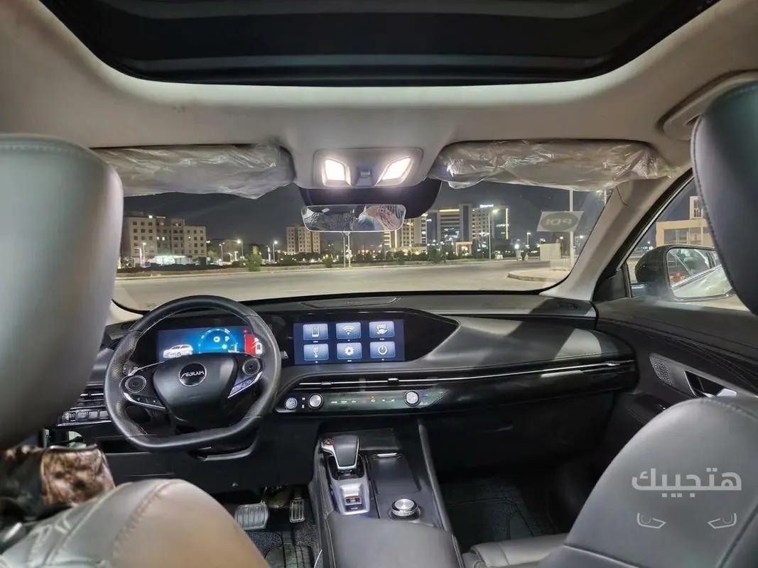 Interior and dashboard view of 2024 Dongfeng Huge