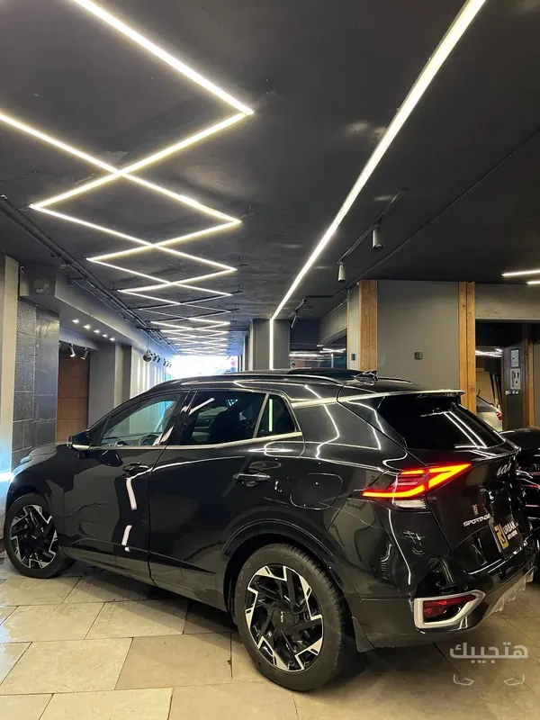 side and rear view of 2026 Kia Sportage