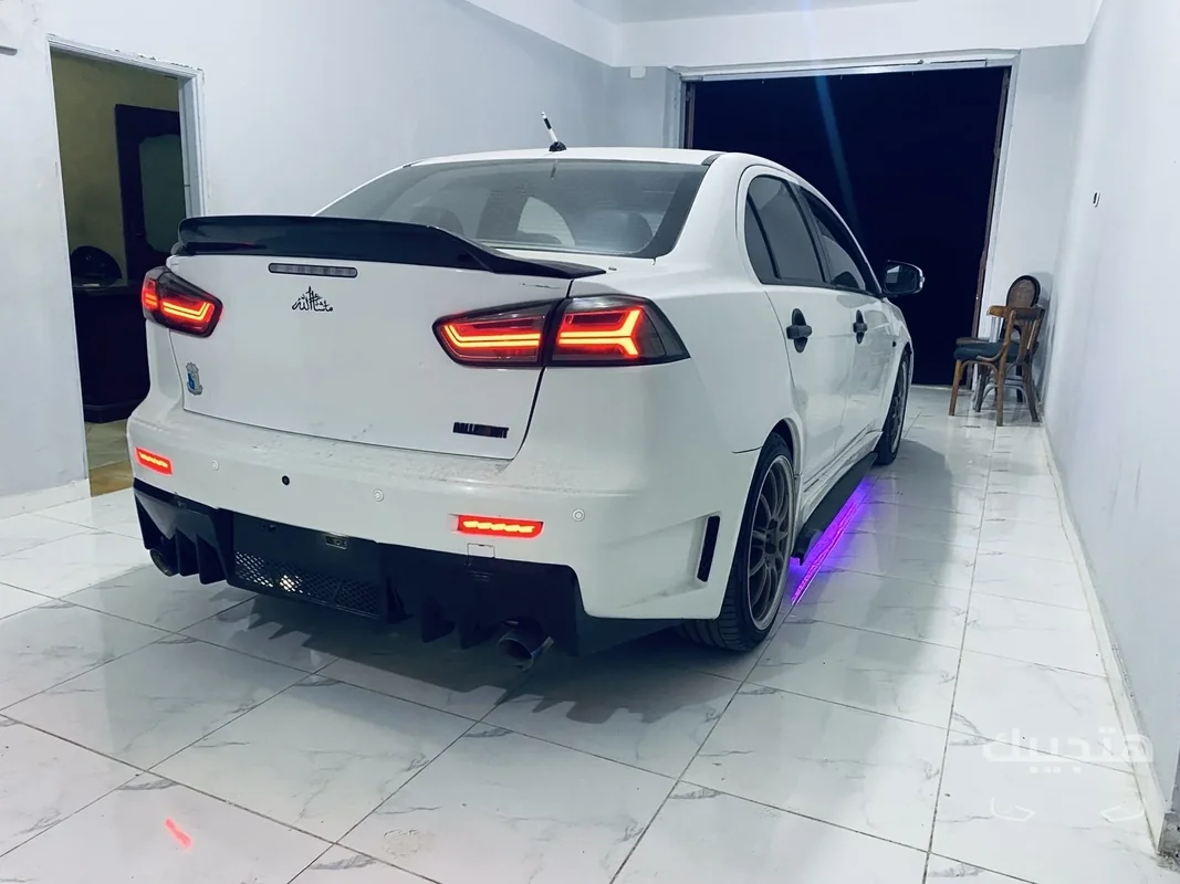 Rear and side view of 2016 Mitsubishi Lancer