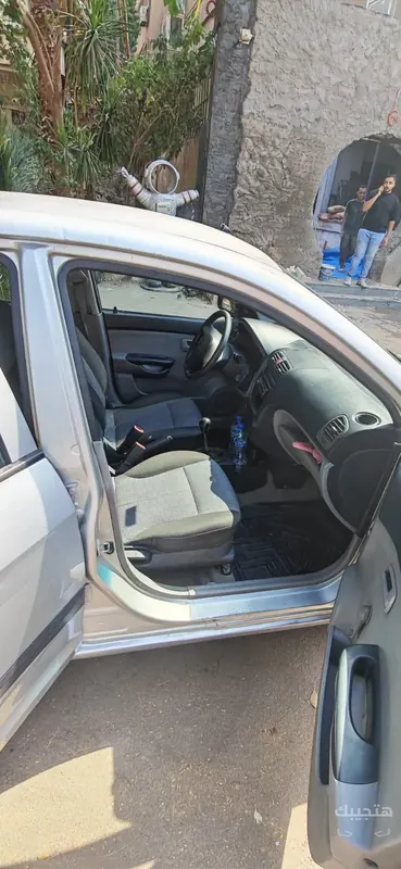 Interior and side view of 2007 Kia Picanto