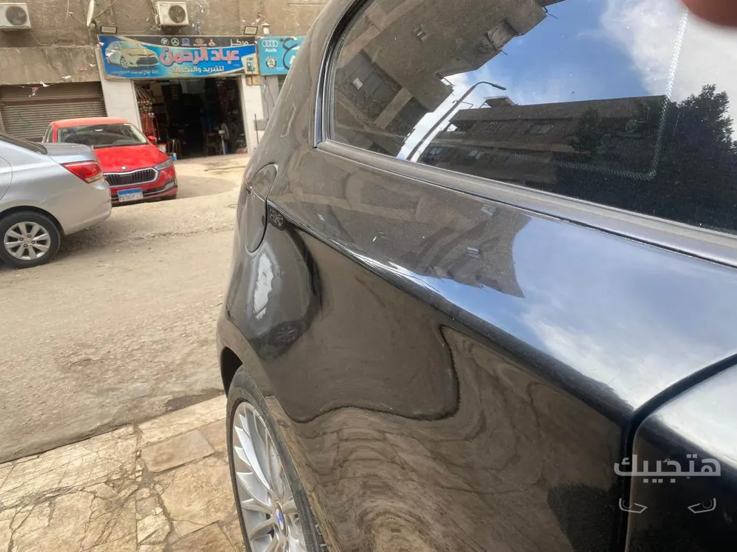 side view of 2008 BMW 118