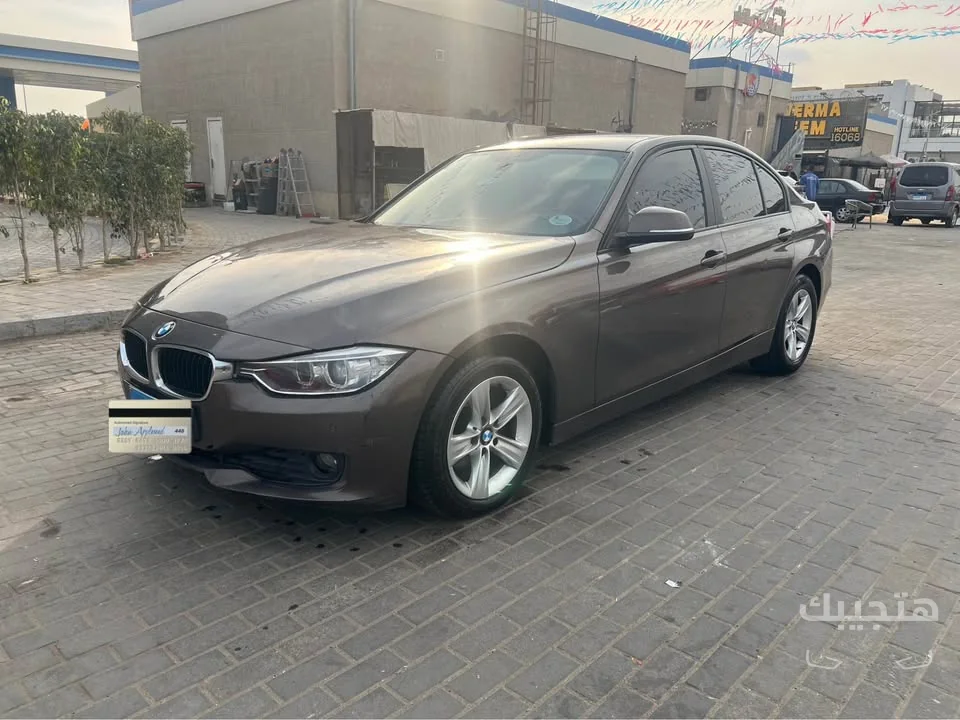 Front and side view of 2014 BMW 316i