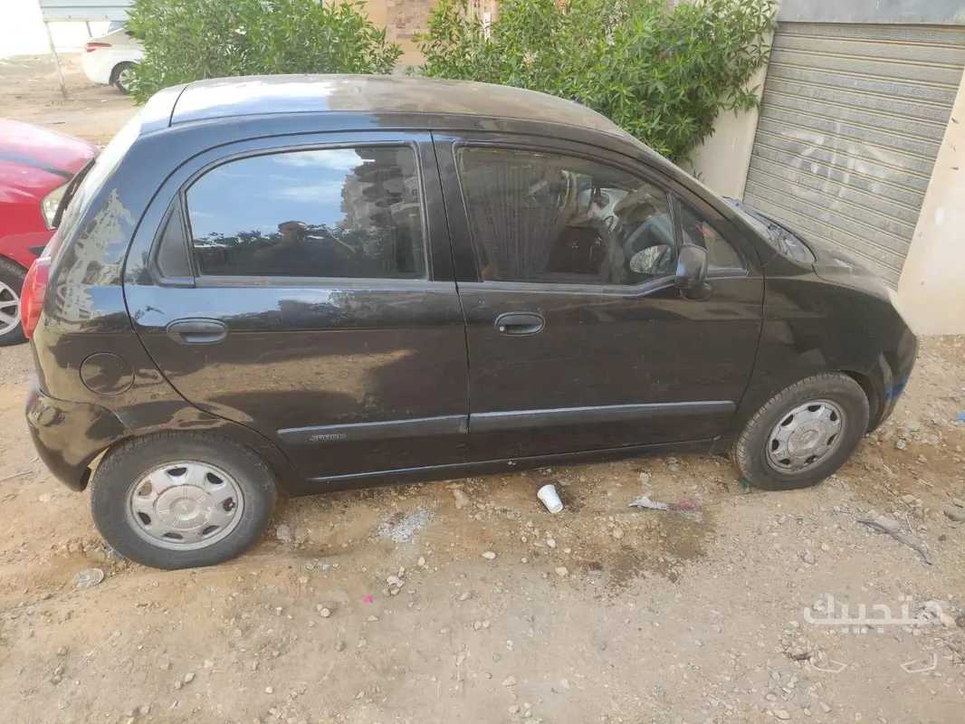 side view of 2010 Chevrolet Spark
