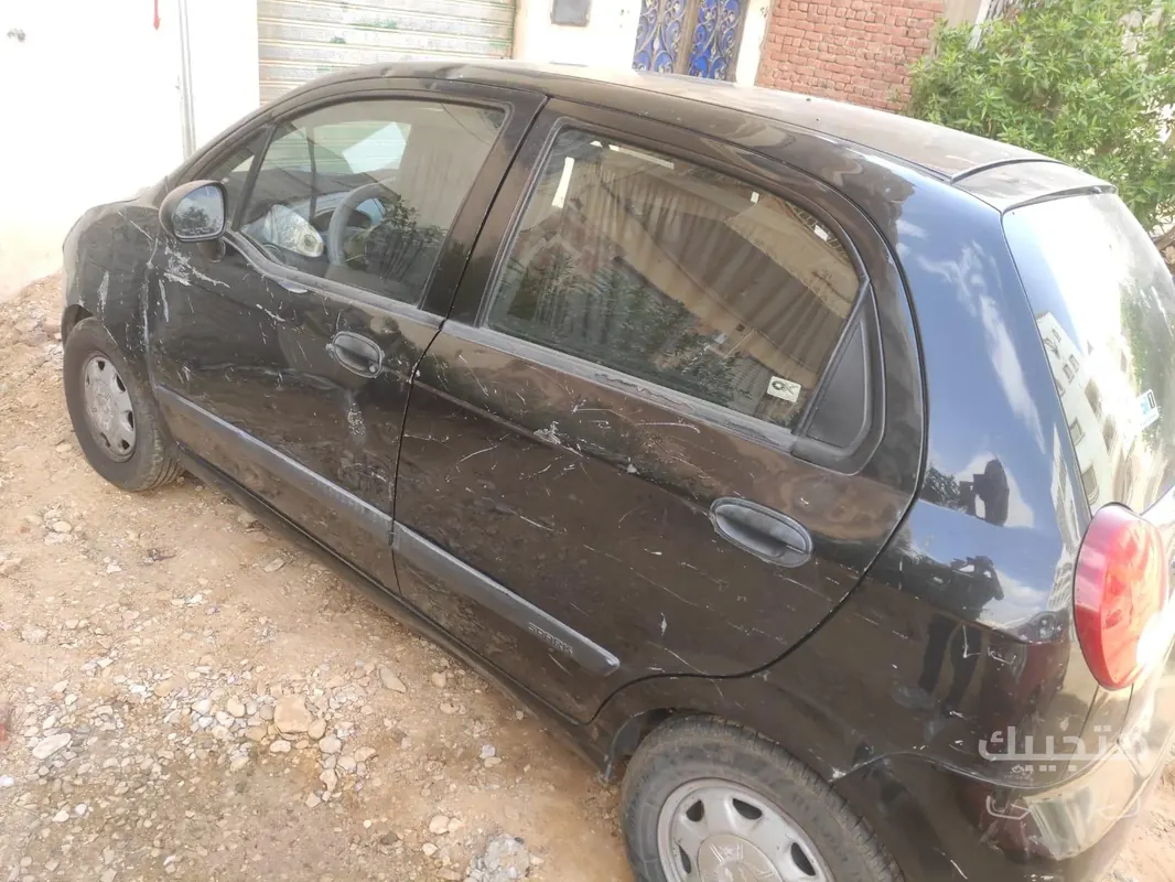 side view of 2010 Chevrolet Spark