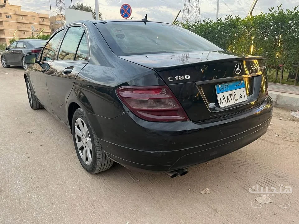 Rear and side view of 2010 Mercedes-Benz C180