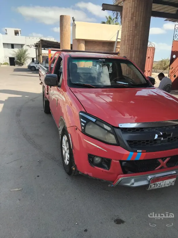 Front, side and interior view of 2015 Chevrolet Pickup/Dababa