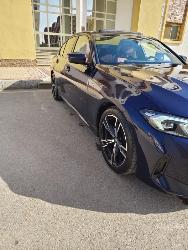 side view of 2024 BMW 320i