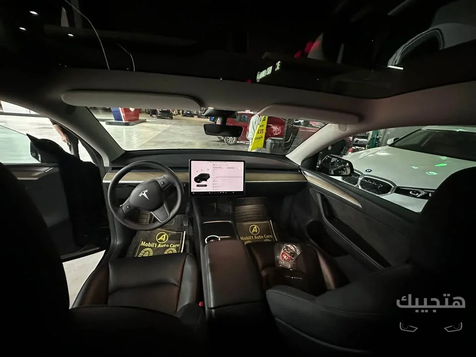 Interior, Dashboard and front view of 2023 Tesla Model Y