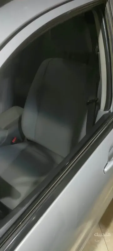 Interior and side view of 2014 Mitsubishi Lancer