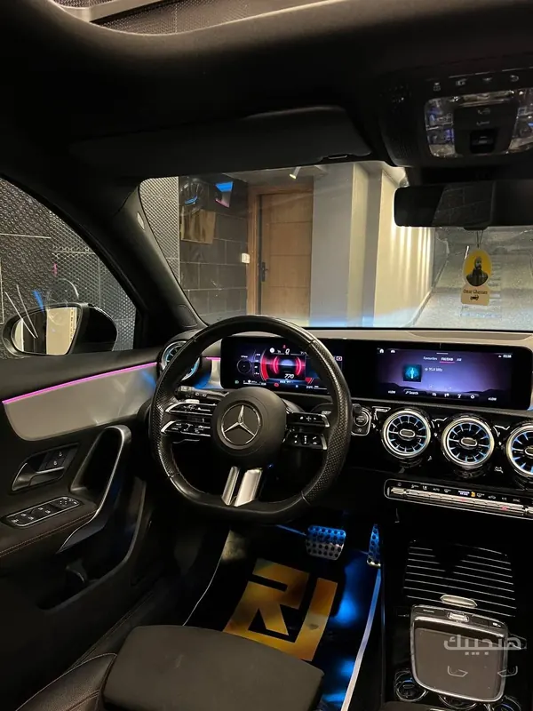 Interior and dashboard view of 2026 Mercedes-Benz E200