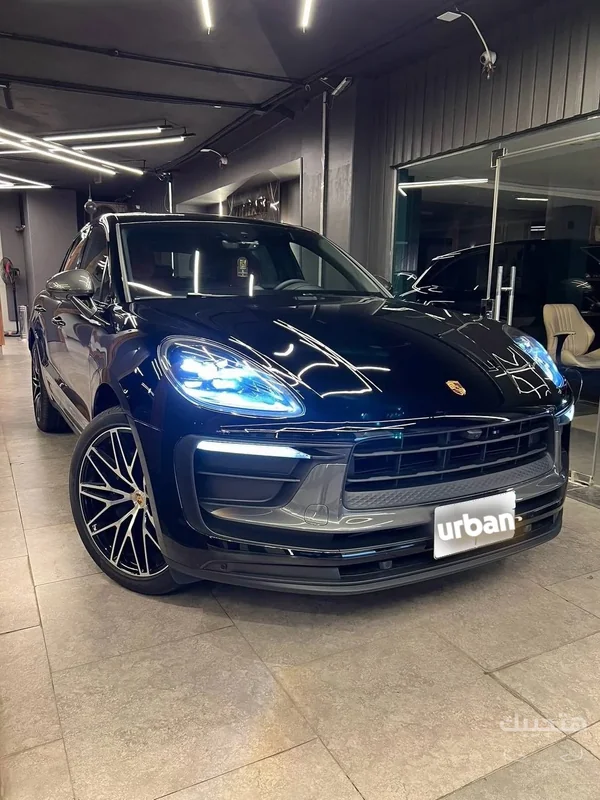 Front and side view of 2026 Porsche Macan