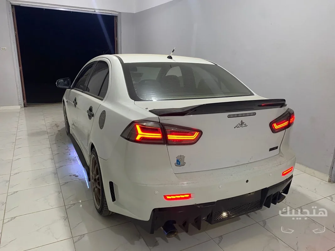 Rear and side view of 2016 Mitsubishi Lancer
