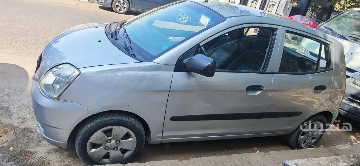 side, Front and interior view of 2007 Kia Picanto