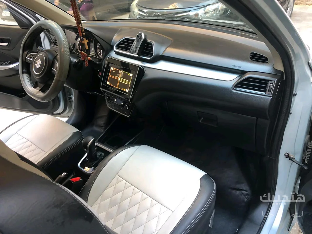 Interior view of 2024 Suzuki Dzire