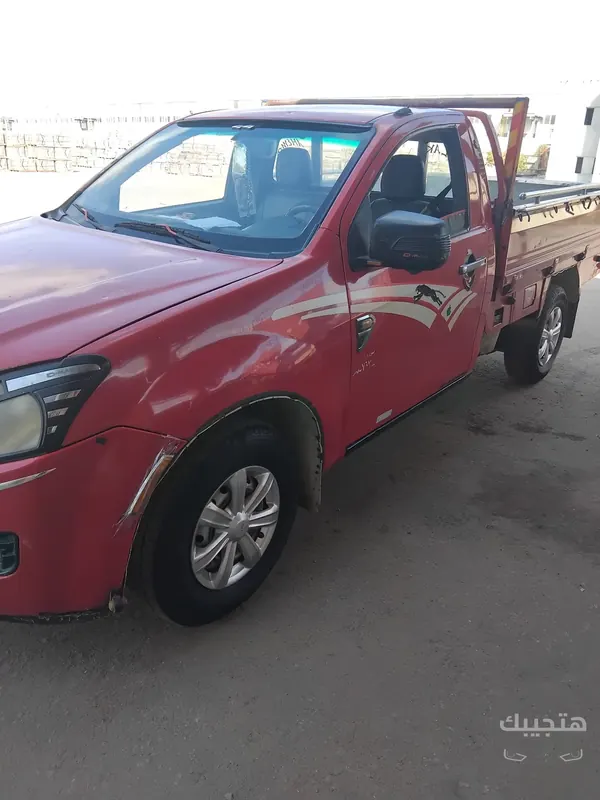 Front, side and interior view of 2015 Chevrolet Pickup/Dababa