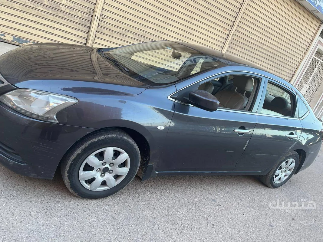 side, Front and rear view of 2015 Nissan Sentra