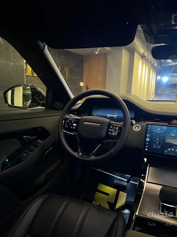 Interior and dashboard view of 2026 Land Rover Evoque