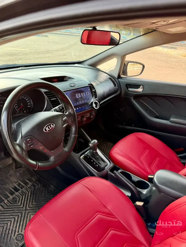 Interior and dashboard view of 2017 Kia Cerato