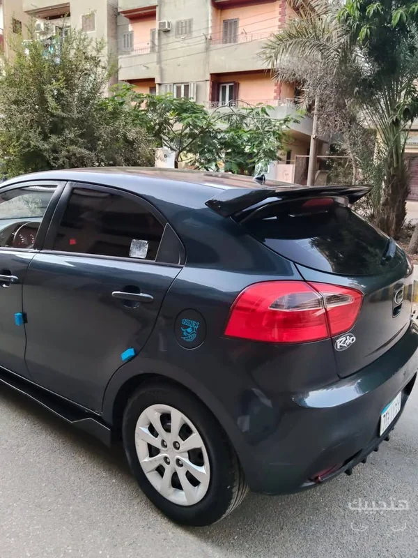 Rear and side view of 2013 Kia Rio