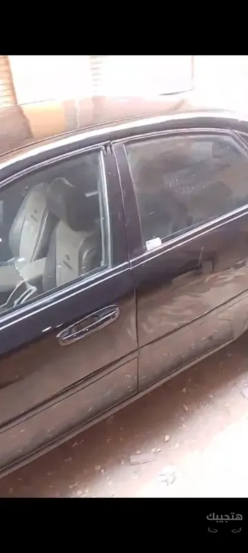 side view of 2009 Chevrolet Optra