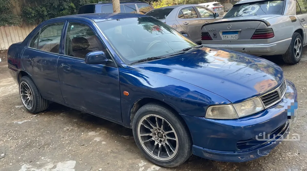 Front and side view of 1998 Mitsubishi Lancer