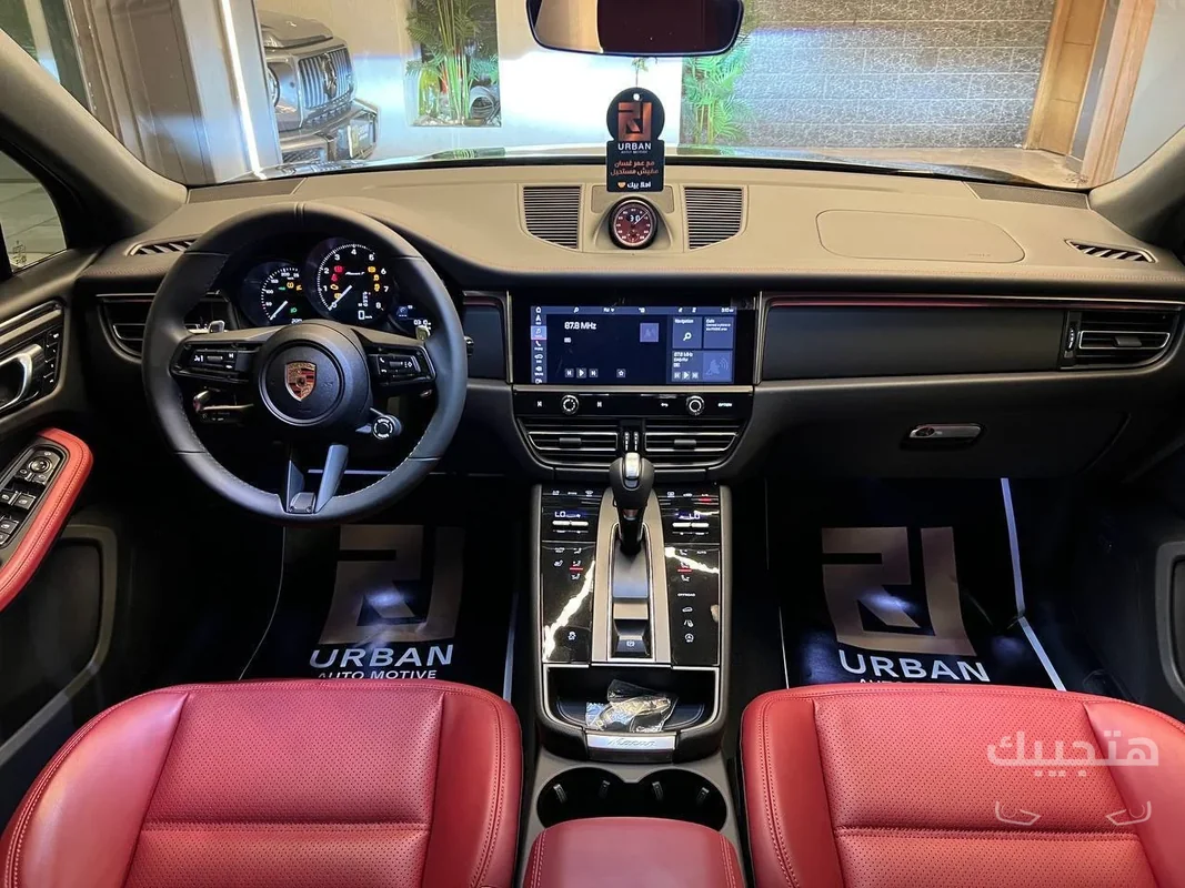 Interior and dashboard view of 2026 Porsche Macan