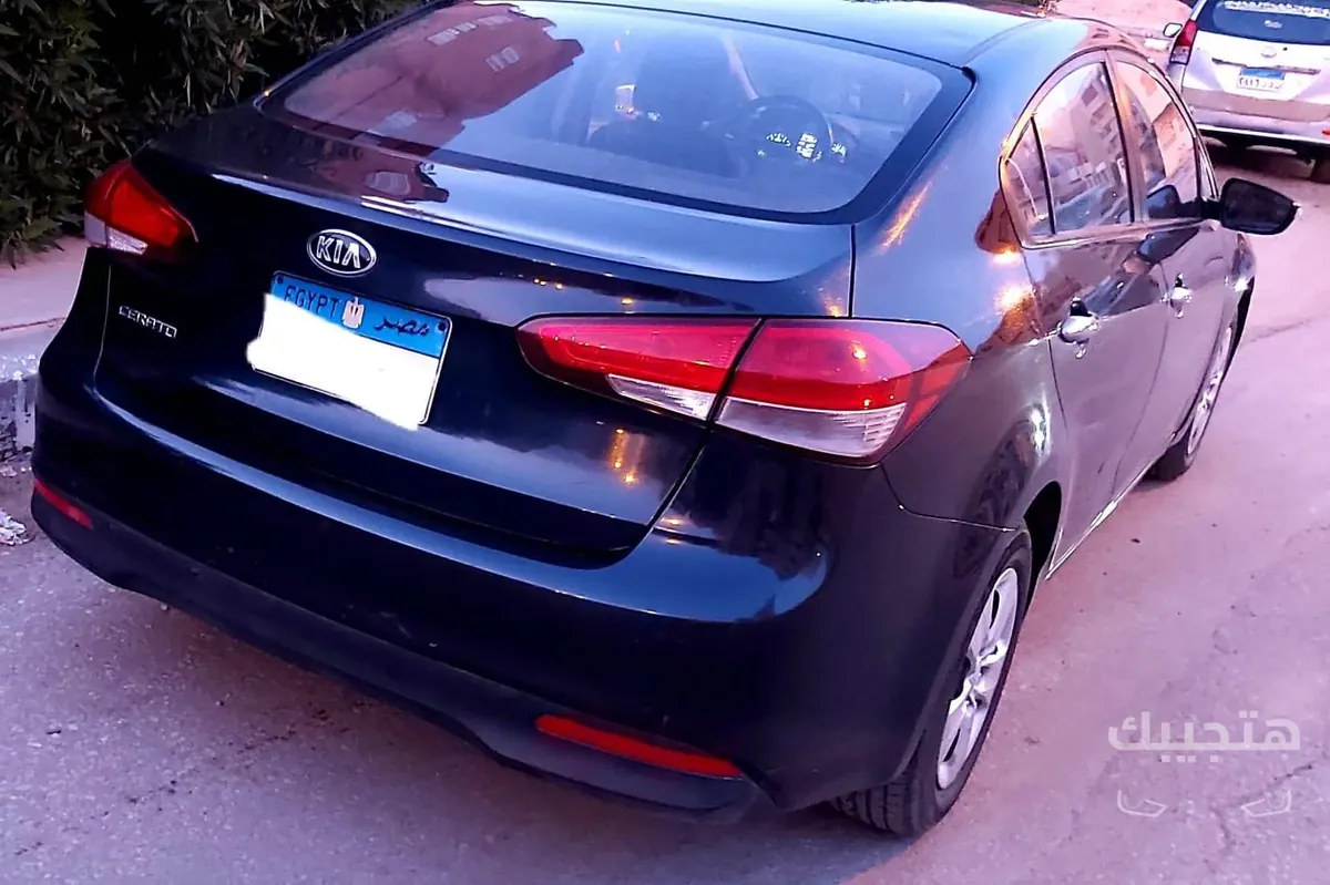 Rear, side and interior view of 2017 Kia Cerato