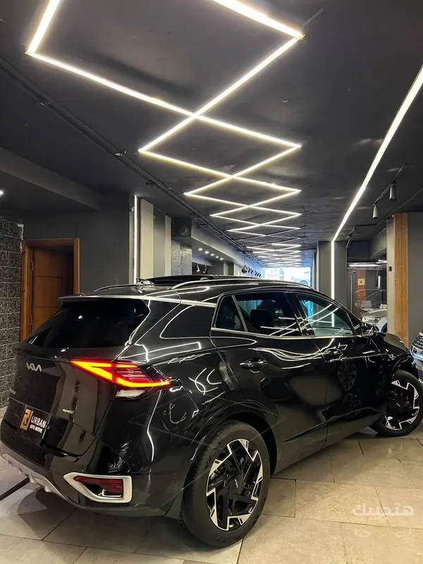 side and rear view of 2026 Kia Sportage