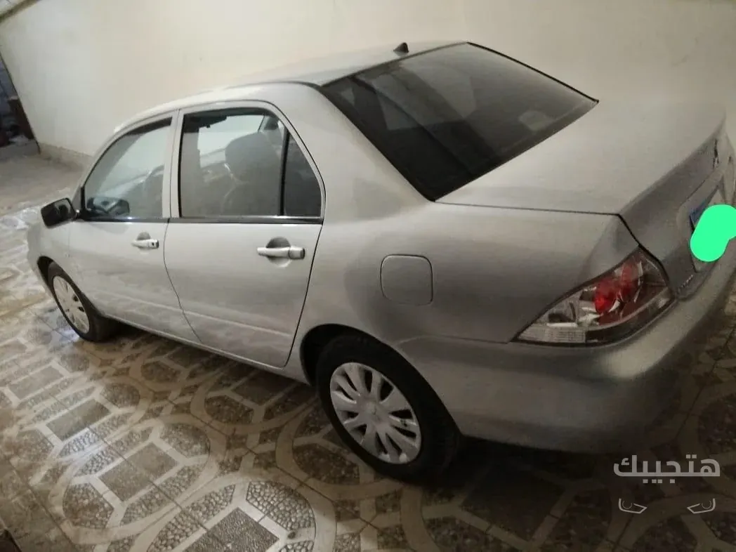 side, Rear and interior view of 2014 Mitsubishi Lancer