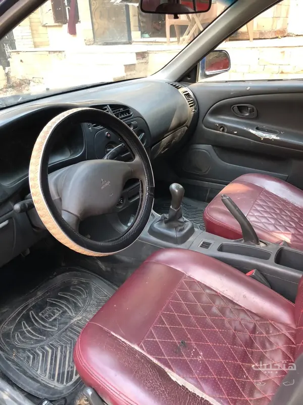 Interior view of 1998 Mitsubishi Lancer