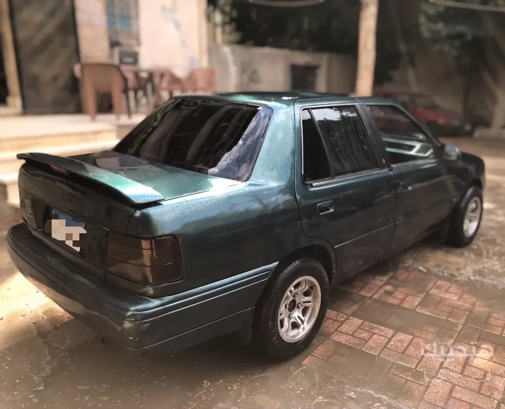 Rear and side view of 1997 Hyundai Excel