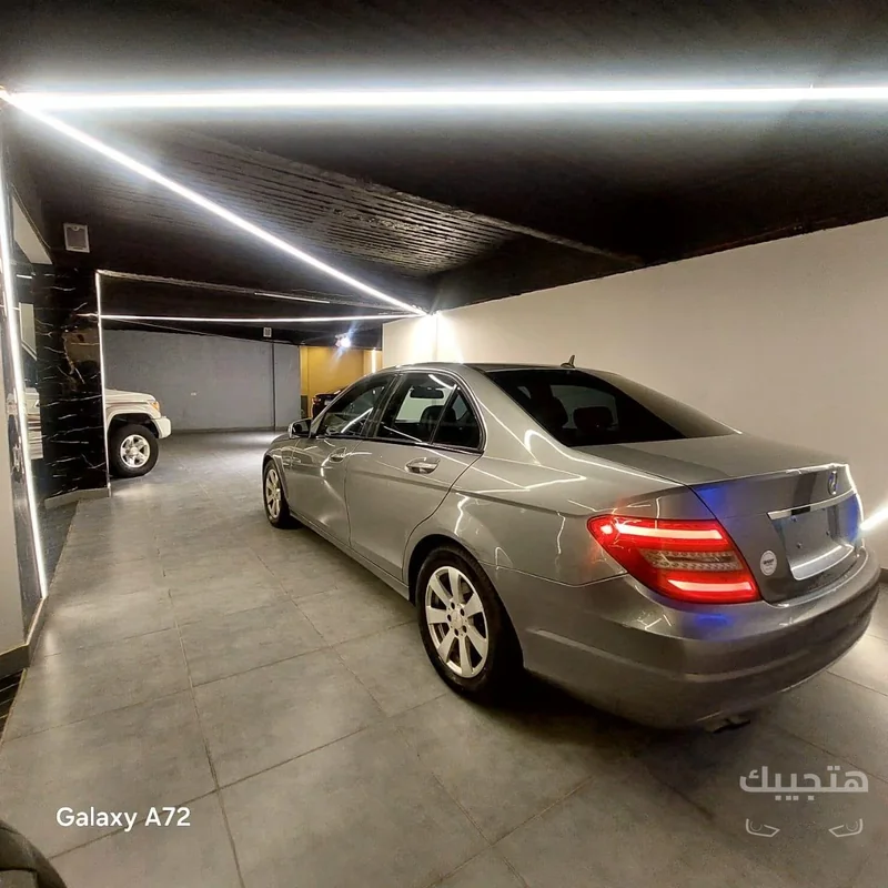 Rear and side view of 2013 Mercedes-Benz C180