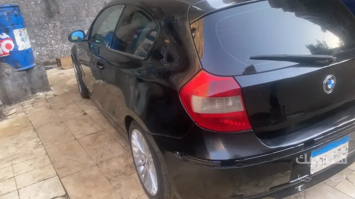 Rear, side and interior view of 2008 BMW 118
