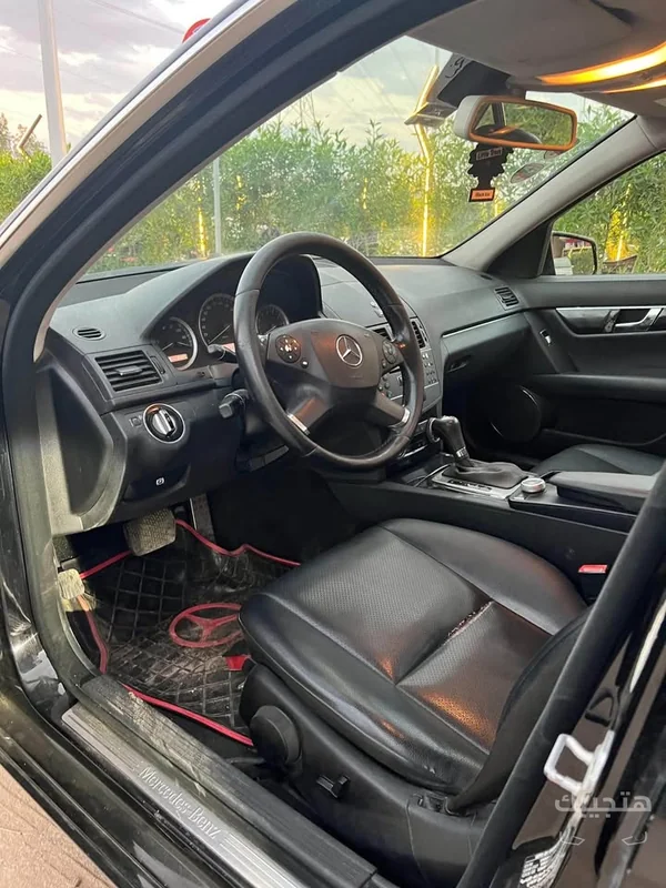 Interior and dashboard view of 2010 Mercedes-Benz C180