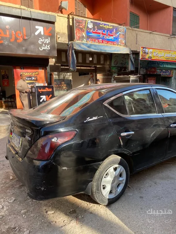 منظر خلفي وجانبي لسيارة نيسان صني موديل 2013