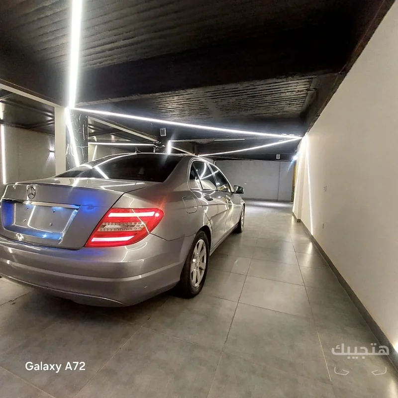 Rear and side view of 2013 Mercedes-Benz C180