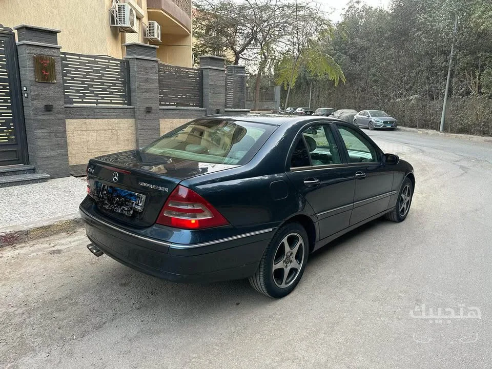 Rear and side view of 2004 Mercedes-Benz C180
